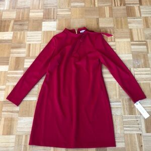 Calvin Klein red dress with bow detail. New with tags. Long sleeves.